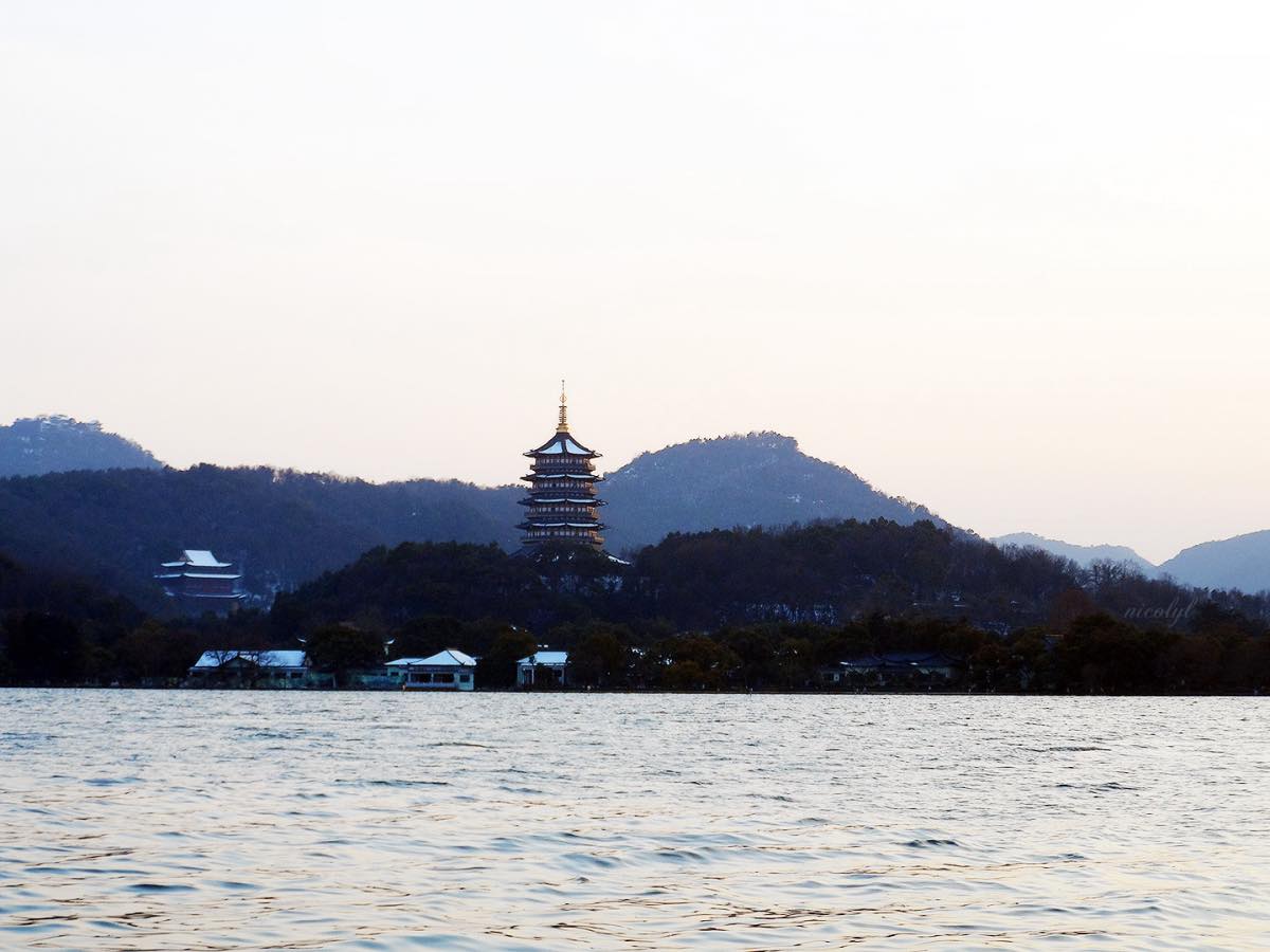 hangzhou west lake pagoda sunset