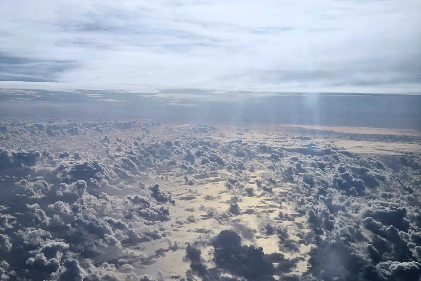 plane clouds sunset